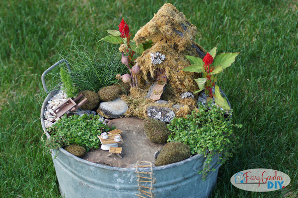 cute fairy garden in an old wash tub