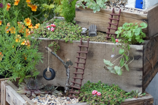 fairy garden with polymer clay ladders