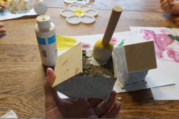 painting the concrete fairy garden houses