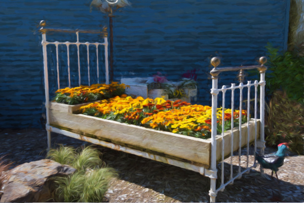 old bed frame as fairy garden container idea