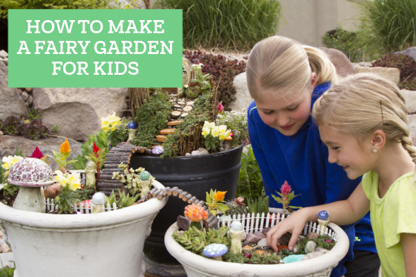 kids looking at a fairy garden