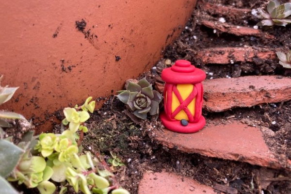 A Fairy House Made from an Old Bottle - Simple Practical Beautiful