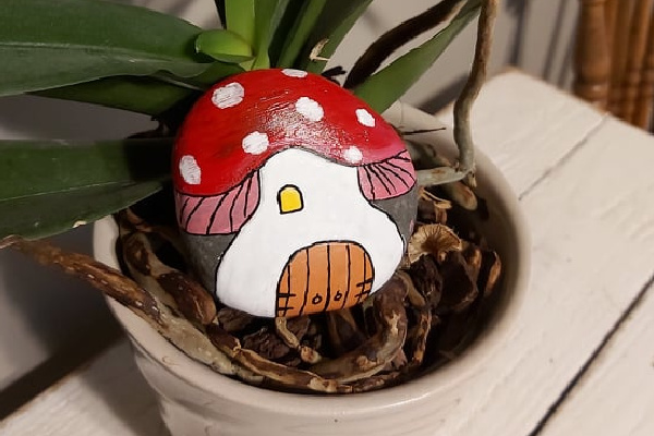 mushroom fairy house painted rock