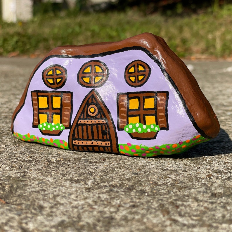 purple fairy house painted rock