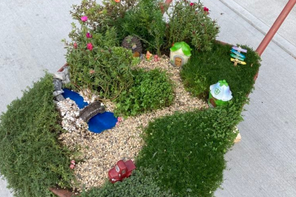 dollar tree fairy garden in a wagon