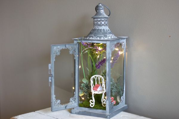 fairy garden inside a lantern